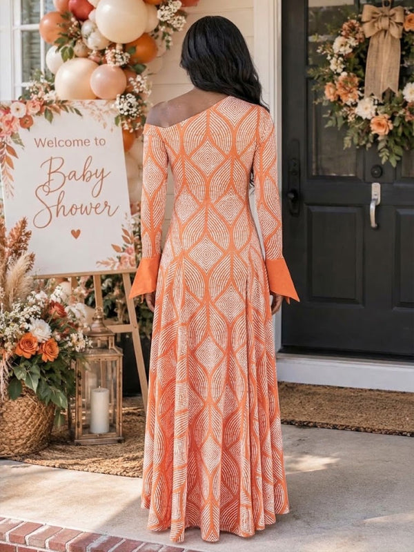 Orange Printed Maternity Maxi Dress with Asymmetric Shoulder and Flowing Silhouette