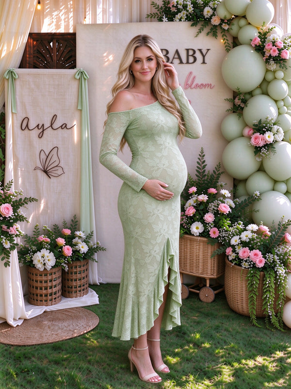 Green maternity maxi dress with an asymmetrical one-shoulder design and delicate ruffle accents, elegant flowing fit