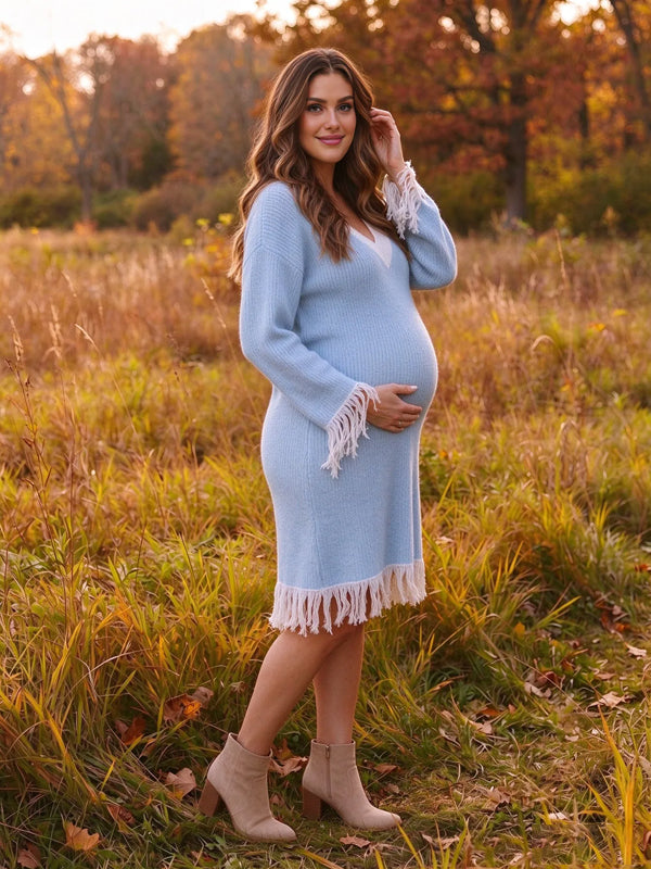 Blue maternity mini dress with contrasting color details and playful tassel accents, stylish short fit
