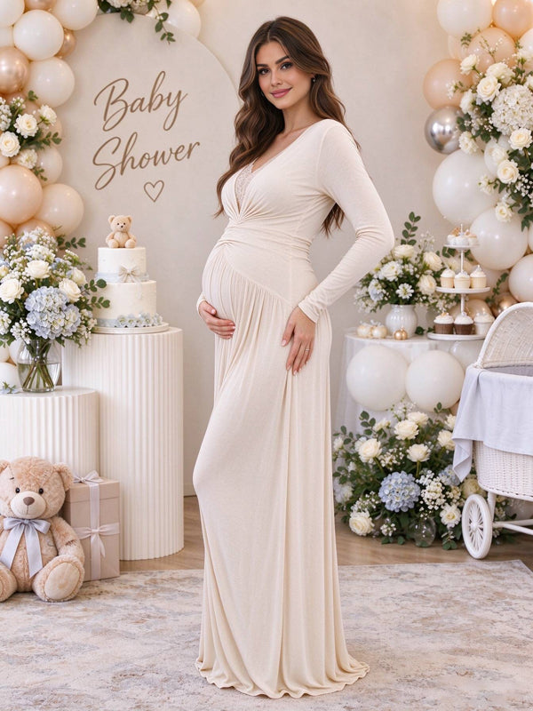 White maternity maxi dress with lace splicing, delicate ruffles and pleated fabric, flattering flowing fit