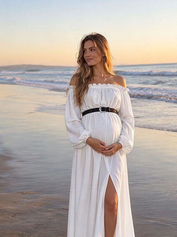 Breezy White Ruffled Off-Shoulder Maternity Maxi Dress with Front Leg Slit on Beach
