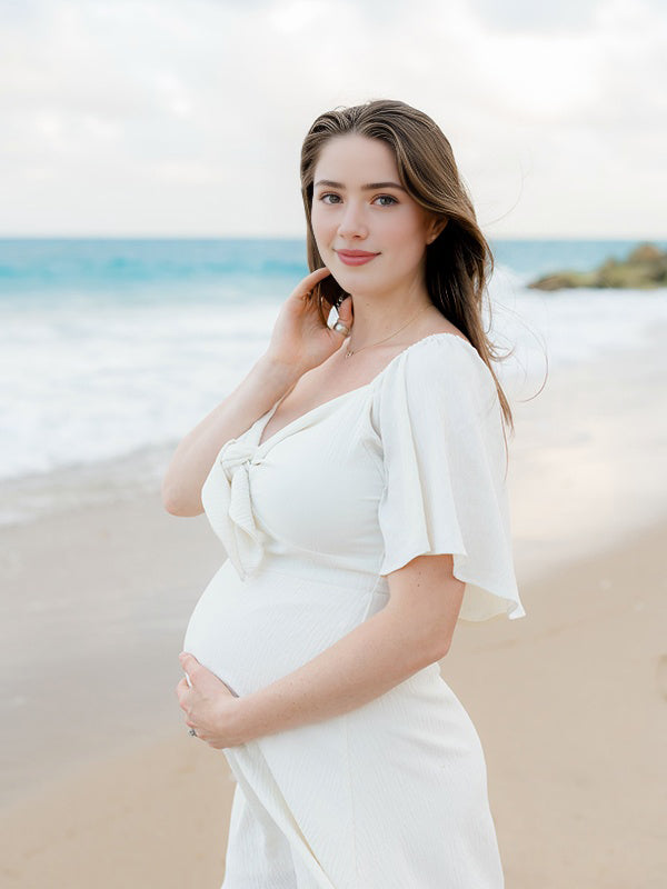 white flowy dress maternity Momyknows Elegant White Knot A-Line Flowy Vacation Photoshoot Maternity Mini Dress White / M