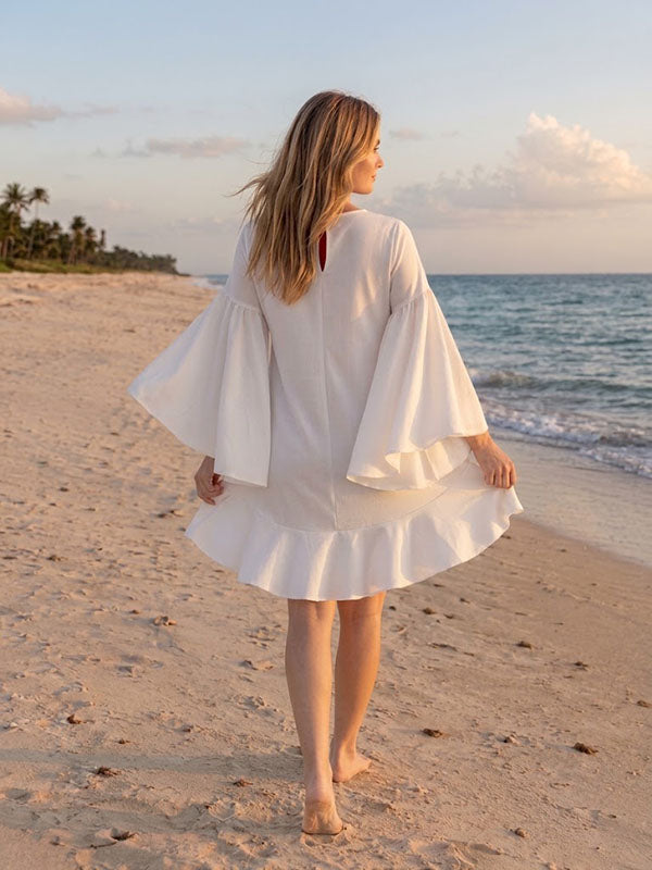 Pure White High-Low Maternity Dress with Ruffle Hem and Dramatic Flare Sleeves Sunset