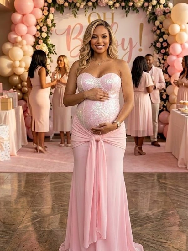 Pink sequin maternity maxi dress with ruched bodycon design and fitted silhouette.