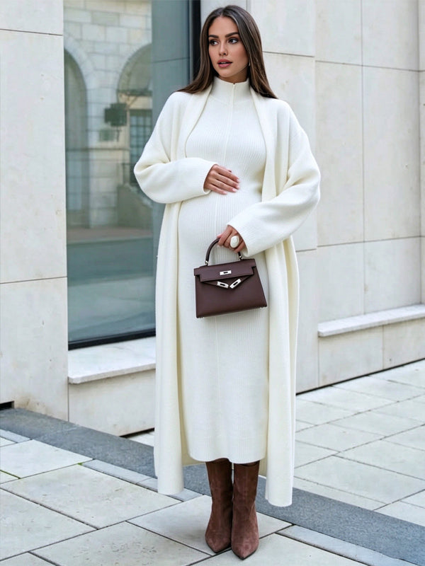 White Maternity Maxi Dress with High Neck and Sleeveless 2-in-1 Cardigan Style and Maxi Fit, Photoshoot