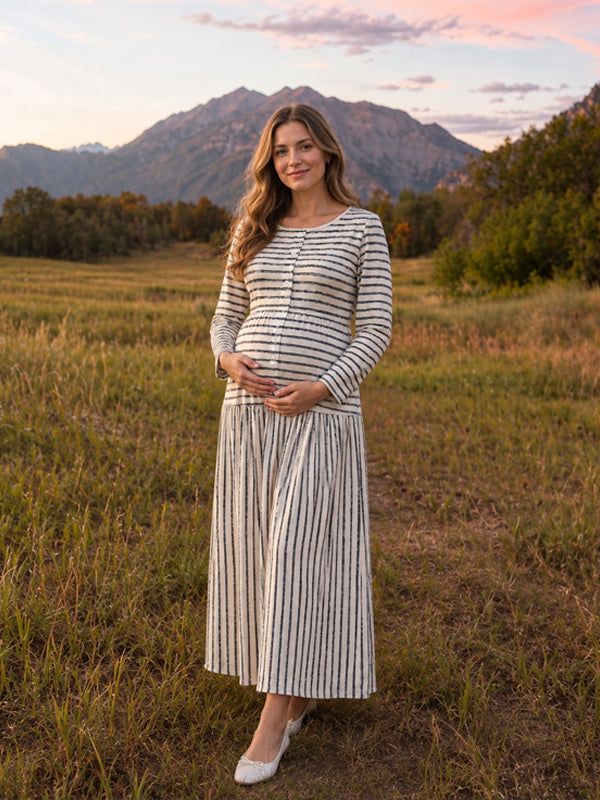 Apricot knitted striped maternity maxi dress with button details and a fitted silhouette, perfect for photoshoots